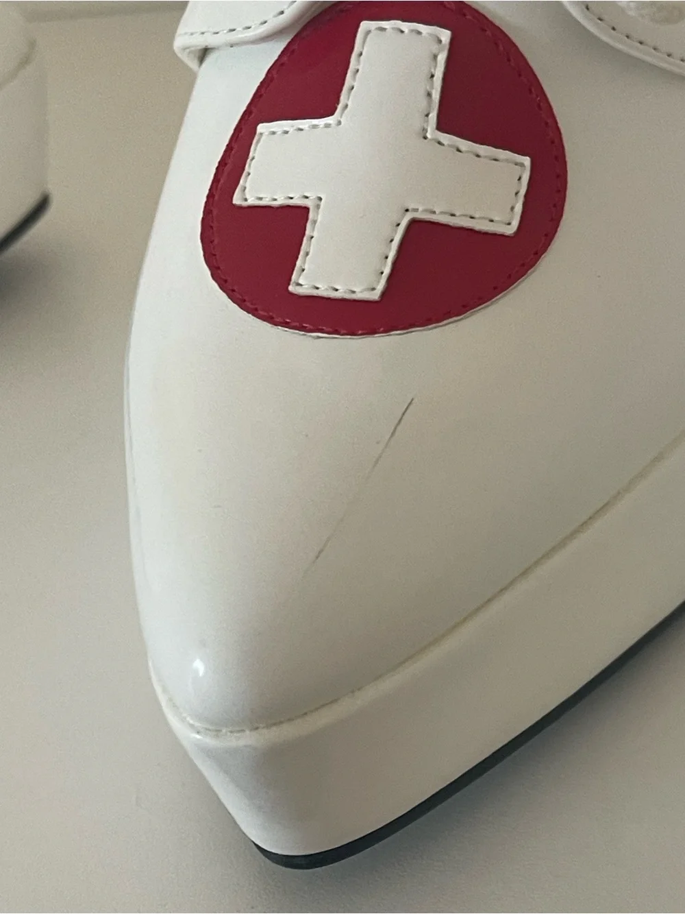 Pleaser White Platform Lace-Up Shoes with Red Cross Detail